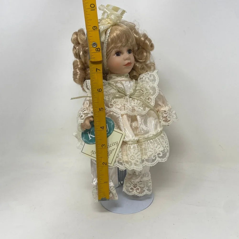 Kelly of Authenticity Porcelain Doll Blonde Curls Lace Champagne Dress 9 Inch‎
